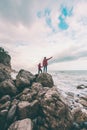 Silhouette of a woman and a child against the sea and sky Royalty Free Stock Photo