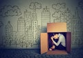 Woman hiding in the box on skyscraper city background Royalty Free Stock Photo
