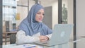 Woman in Hijab Doing Video Chat in Office Royalty Free Stock Photo