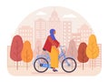 Woman in Hijab Riding Bicycle in City Park