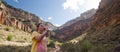 Woman Hike and drinking water in Grand Canyon Royalty Free Stock Photo