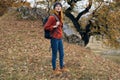 woman hiker backpack nature autumn forest travel