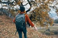 woman hiker backpack nature autumn forest travel