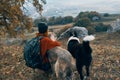 woman hiker dogs travel friendship nature landscape