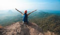 woman hiker enjoy the view on cliff edge top of mountain Royalty Free Stock Photo