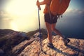 Hiker enjoy the view at sunrise seaside mountain Royalty Free Stock Photo