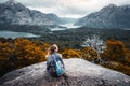 Woman hiker enjoys the valley view Royalty Free Stock Photo