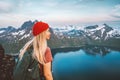 Woman hiker exploring Norway with backpack active healthy lifestyle mountains adventures travel vacations Royalty Free Stock Photo