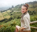 Woman hiker in front of beautiful landscape view