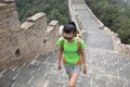 Woman hiker hiking on great wall Royalty Free Stock Photo