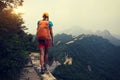 Woman hiker hiking on great wall Royalty Free Stock Photo