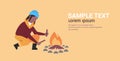 Woman hiker making fire african american girl holding firewood for bonfire hiking camping concept traveler on hike