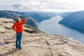 Woman hiker on Pulpit Rock / Preikestolen, Norway Royalty Free Stock Photo