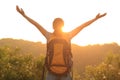 Woman hiker raised arms mountain top Royalty Free Stock Photo