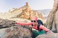 Woman hiker reached mountain top, backpacker adventure Royalty Free Stock Photo