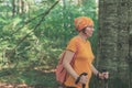Woman hiker trekking and walking in forest Royalty Free Stock Photo