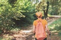 Woman hiker trekking and walking in forest Royalty Free Stock Photo