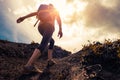 Woman hiker walks on the trail