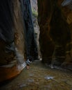 Woman Hikes Into Narrow Slot Canyon