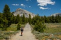 Woman Hikes Toward Lembert Dome in Yosemite