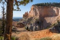 Woman Hikes the Under the Rim Trail in Bryce Canyon