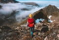 Woman hiking alone in mountains with red backpack adventure travel lifestyle Royalty Free Stock Photo