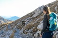 Hochschwab - A woman hiking with a mountain goat