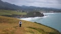 Woman Hiking a Coastal Path to Arenal de Moris Beach in Spain Royalty Free Stock Photo