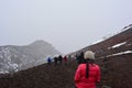 Woman hiking the Cotopaxi volcano near to Quito, Ecuador