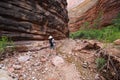 Woman hiking in Hance Creek in the Grand Canyon.