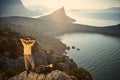 Woman hiking mountains and looking at sunrise Royalty Free Stock Photo