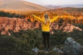 Woman hiking outdoor raised hands enjoying canyon view in Albania travel lifestyle hiker in mountains Royalty Free Stock Photo