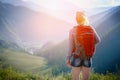 Woman hiking outdoors. Eco Tourism. Royalty Free Stock Photo