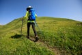 Woman hiking in prairie mountains