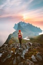 Woman hiking solo traveling in Norway outdoor active summer vacations healthy lifestyle girl hiker with backpack Royalty Free Stock Photo