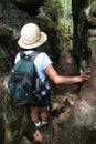 Woman Hiking Through Split Rock Royalty Free Stock Photo