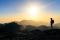 Woman hiking success silhouette in mountains sunset Royalty Free Stock Photo