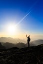 Woman hiking success silhouette in mountains sunset Royalty Free Stock Photo