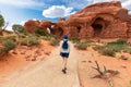 Woman Hiking to Double Arch in Utah National Park Royalty Free Stock Photo