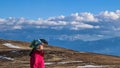 Woman on hiking trail from mountain hut Wolfsbergerhuette Wolfsberger Huette on Saualpe, Lavanttal Alps, Carinthia