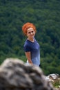 Woman hiking on a trail in the mountains Royalty Free Stock Photo