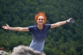 Woman hiking on a trail in the mountains Royalty Free Stock Photo