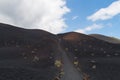 Woman hiking in volcanic landscape, La Palma, Canary islands, Spain Royalty Free Stock Photo