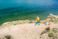 Woman hiking walking with dog on seaside trail Royalty Free Stock Photo