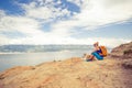 Woman hiking walking with dog on seaside trail Royalty Free Stock Photo