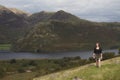 Woman hill walking in the Lake District