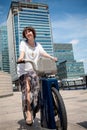 Woman with a hire bike. London, England Royalty Free Stock Photo