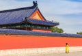 Woman in historic chinese dress in Temple of Heaven Park in Beijing