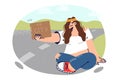 Woman hitchhikes and sits by road with to city sign to save money on transport and not pay tolls Royalty Free Stock Photo