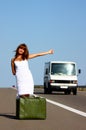 Woman hitchhiking